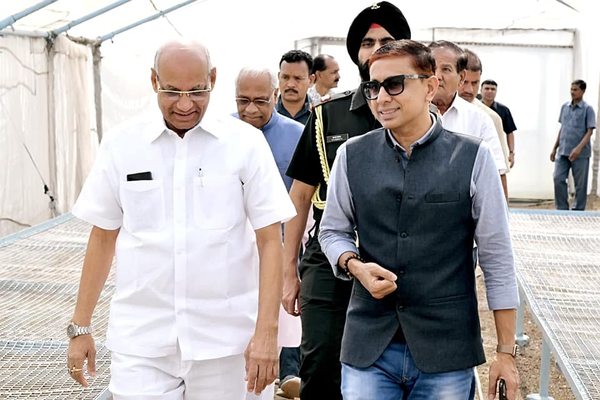 CA Arvind Agrawal walking with Governor of Chhattisgarh at VNR farm
