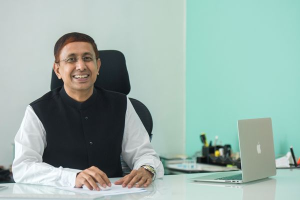 CA Arvind Agrawal at his desk